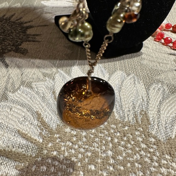 Beautiful amber stone hangs from chain with delicate clusters of small beads. - Picture 11 of 13